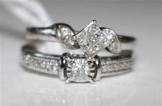 Two diamond set rings